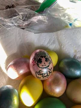 Dyed Easter Eggs Sitting in a Towel Stock Photos