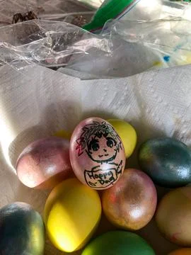 Dyed Easter Eggs Sitting in a Towel Stock Photos