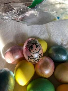 Dyed Easter Eggs Sitting in a Towel Stock Photos