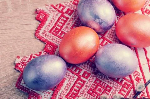 Dyed eggs for Easter in red and pearl color Stock Photos