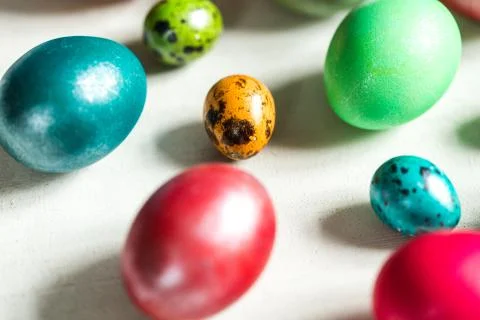 Dyed eggs on white background Stock Photos