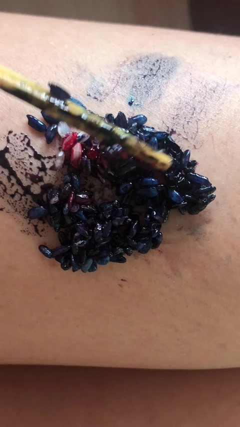 Dyed Rice Texture Rubbing On Arm Food Contact Close-Up Stock-Footage 333062977