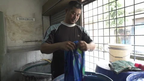 Dyeing Batik Textile.01 Stock Footage 122194212