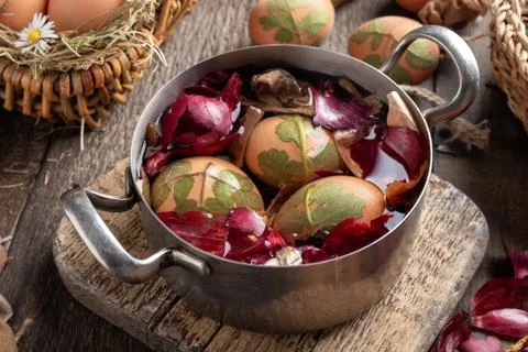 Dyeing Easter eggs with onion peels Stock Photos