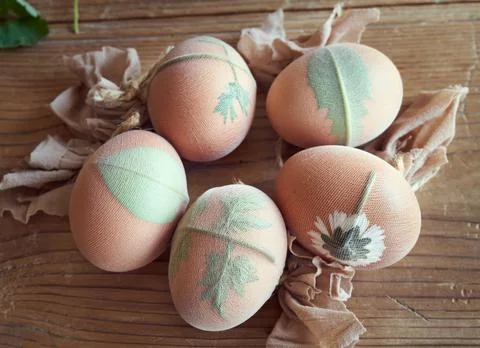 Dyeing Easter eggs with onion peels in spring Stock Photos