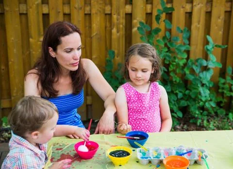 Dyeing Easter Eggs Outside with Mom Stock Photos