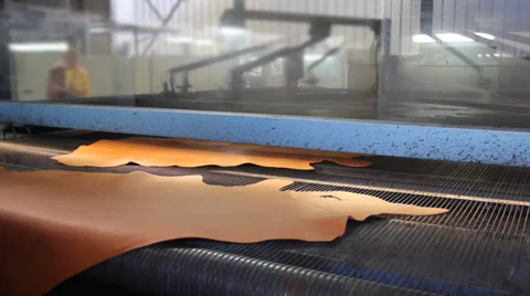 Dyeing leather in tannery Stock Footage 32500932
