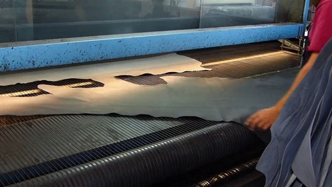 Dyeing leather in tannery Stock Footage 83480599