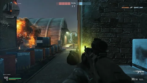 Dying to an enemy shot in a modern first-person shooter warfare video game Stock Footage 230046021