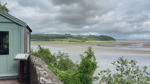 Dylan Thomas writing shed overlooking the estuary of the River Taf, Laugharne. Stock Footage 247265669