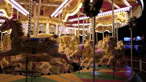 Dynamic 4K: Nighttime Horse Carousel Galloper Ride Stock Footage 256985390