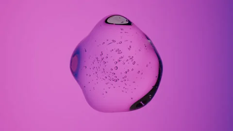 Dynamic Abstract 3D Water Drop with Internal Bubble Details on Contrasting Neon  Stock Footage 337303349