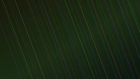 Dynamic abstract background with colorful diagonal lines moving across a da.. Video stock 340541390