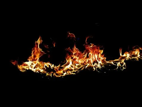 Dynamic Abstract Background Showcasing Vibrant Fire Flames Dancing Against .. Stock Photos