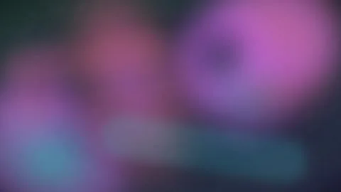 Dynamic abstract blurred light background with vibrant purple pink and teal.. Video stock 345548854