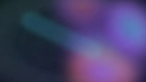Dynamic abstract light leaks background with vibrant purple blue and teal c.. Video stock 345547022