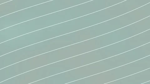 Dynamic abstract motion graphics with cool blue and green diagonal lines Stock Footage 325773056