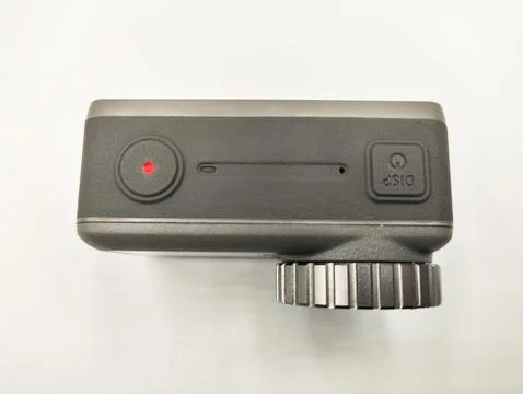 Dynamic Action Camera Isolated on White Background: Essential Gear for Adve.. Stock Photos