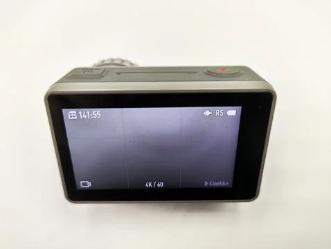 Dynamic Action Camera Isolated on White Background: Essential Gear for Adve.. Stock Photos