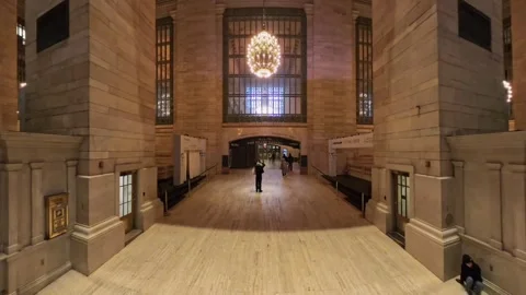 Dynamic Aerial Backward View of Grand Central Concourse with Iconic Clock, NYC Stock Footage 302388093