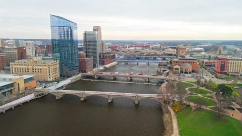 Dynamic aerial footage flying over Grand Rapids, Michigan Stock Footage 308205339