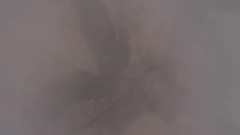 Dynamic Aerial fpv shot falling from the cloud at Bardenas Reales desert Stock Footage 232687471