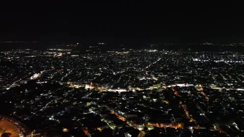 Dynamic aerial night vision: a sprawling metropolis Stock Footage 325188775