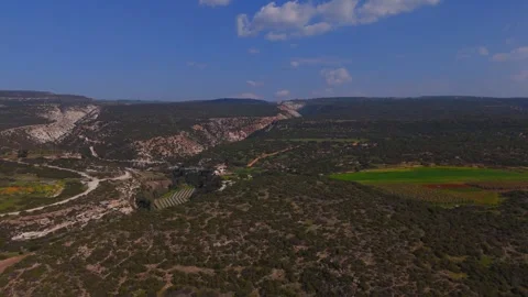 Dynamic Aerial Pan: Zig Zagging Avakas Gorge Cutting into the Landscape Stock Footage 321713913