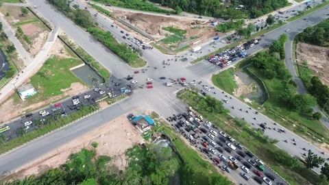 Dynamic Aerial Perspective of a Bustling City Intersection Video stock 320107886