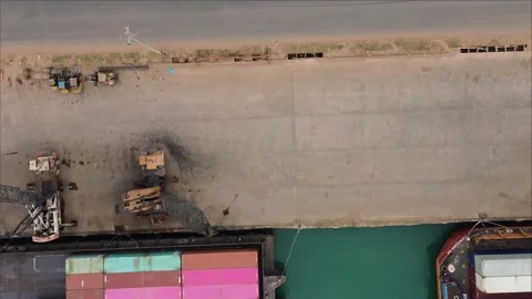 Dynamic Aerial Perspective of Bustling Maritime Logistics Operations at a V.. Video stock 339034686