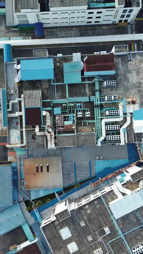 Dynamic aerial perspective of an extensive modern industrial and manufactur.. Stock Footage 339040125