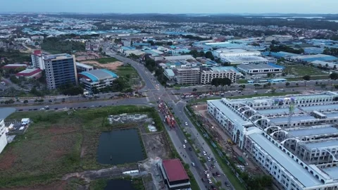 Dynamic Aerial Perspective of a Thriving Tropical Cityscape with Modern Arc.. Video stock 325203996
