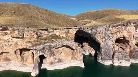 Dynamic Aerial Push and Pull Around Dramatic Canyon Caves Stock Footage 340139349