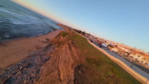Dynamic aerial shot over beach during sunset Stock Footage 344562001