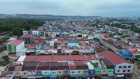 Dynamic aerial survey of a bustling Southeast Asian urban district, highlig.. Stock-Footage 339030804