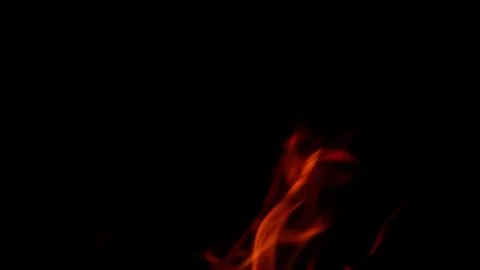 Dynamic and Mesmerizing Fire Flames Dance Elegantly Against a Dark Background Se Stock Photos