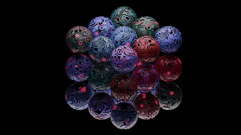 Dynamic animation of  colored balls. Color gradient animation with cutout ef Stock Footage 327612736