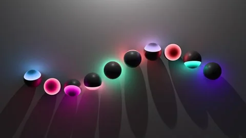 Dynamic animation  of colored balls with iridescent light and color gradient Stock Footage 327612737
