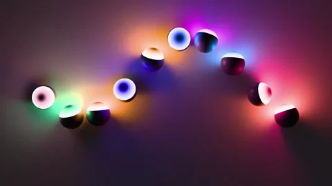 Dynamic animation of colored balls with iridescent light and color gradient. Stock Footage 327613125