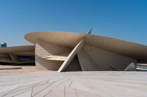 Dynamic architectural perspective of the National Museum of Qatar. Stock Photos