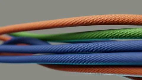 Dynamic Arrangement of Blue, Green and Orange Cords Stock Footage 311844293