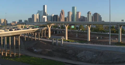 Dynamic Ascent Over Houston Construction Zone Revealing City Skyline and Stock Footage 333270825