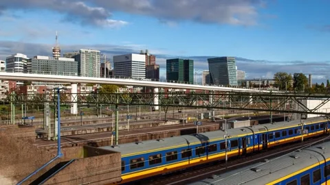 Dynamic Autumn Scene at The Hague Central Railway Station Timelapse Stock Footage 312930770
