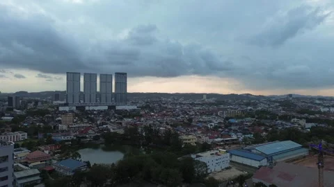 Dynamic Batam urban panorama showcasing modern towers amidst a sprawling re.. Stock Footage 339037311