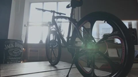 Dynamic Bicycle Showpiece: Reflective Elegance in Studio Light Stock Footage 257762818