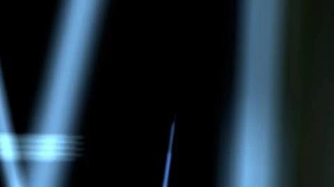 Dynamic blue light beams create a dramatic, modern abstract background with a Stock Illustration