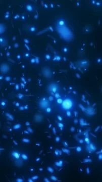 Dynamic blue particles floating in dark space, creating an abstract motion .. Stock Illustration