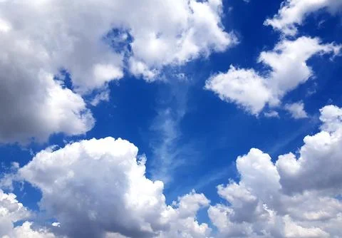Dynamic Blue Sky With Cumulus Clouds Stock Photos