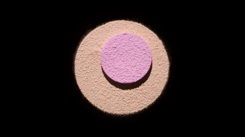 Dynamic blush powder display with rotating light effects Stock Footage 341665289
