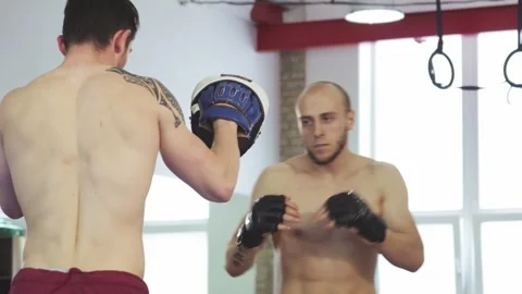 Dynamic boxing training session between two skilled fighters Video stock 311672322